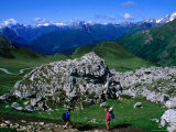 Couple Hiking with Baby Near Passo Giau  Cortina  Italy