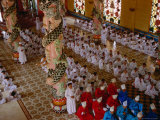 Priests and Other Worshipers Praying in Caodai Great Temple  Tay Ninh  Vietnam