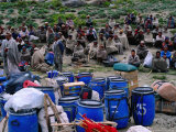 Porters Waiting for Loads to Be Distributed in Hindu Kush Range  Pakistan