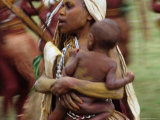 Mother Carrying Baby  Blur  Papua New Guinea