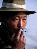 Portrait of Man Smoking  China