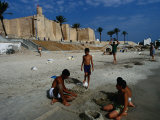 Children Playing on Beach in Front of Restored Fort Ribat  Monastir  Tunisia