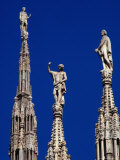 Stone Statues Stand Atop the Spires of the Duomo  Milan  Lombardy  Italy