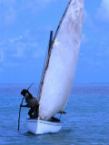 A Fisherman Using a Piece of Wood to Help Propel His Sail-Boat  Rodrigues Island  Africa