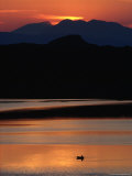 Boat in Lake at Sunset  Highland  Scotland