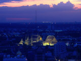 Wat Pho Lit Up at Night and City Buildings  Bangkok  Thailand