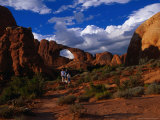 People Standing in Front of the Skyline Arch  Arches National Park  USA