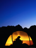 Camper Reading by Lantern in Tent at Dusk  Yosemite National Park  USA