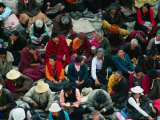 Worshippers Sitting Outside Main Assembly Hall at Sera Monastery  Lhasa  Tibet