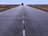 A Truck Travelling along the Desert Road Near Germa in the Ubari Sand Sea Region  Ash Shati  Libya