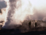 People Silhouetted Against Steam from Geyser Vent  Sol De Manana  Bolivia