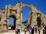 Tourists at the Triumphal Arch Built in Honour of the Emperor Hadrian  Jerash  Jordan