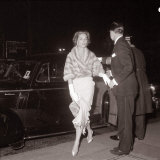 Lauren Bacall is Helped out of Her Car at the Royal Film Show  February 1959