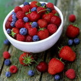 Summer Fruit  Blackberries  Strawberries  Raspberries  Blueberries and Cherries on Rustic Table