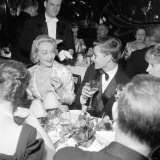 Marlene Dietrich with Yves St Laurant in Paris Sitting in a Restaurant  November 1959