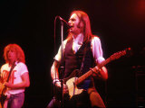 Francis Rossi Playing at the Hammersmiths Odeon with His Band Status Quo