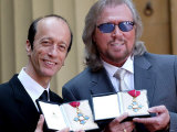 Robin and Barry Gibb with Their Obe's at Buckingham Palace  Holding Medals  May 2004