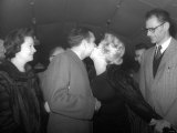 Marilyn Monroe Kisses Sir Laurence Olivier Farewell  Leaving with Her New Husband Arthur Miller