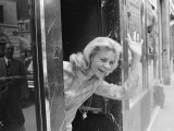 Lauren Bacall in Paris  Waving out from an Entrance  July 1968