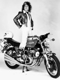 Marc Bolan Standing on Motor-Bike  1976