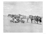 Cowboys Observe a Map on the Ground Photograph - Texas