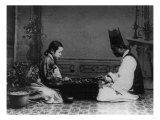 Korean Man and Woman Playing a Game Photograph - Korea