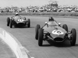 Graham Hill Leads in his Lotus 16 from Jack Brabham in Cooper T45  1958 British Grand Prix