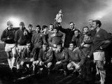 Leeds United Manager Don Revie Proudly Holds the League Championship Trophy