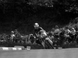 Isle of Man TT Racing-Frank Perris on His Way to Second Place on His Suzuki Bike