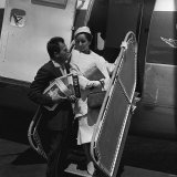 Mike Todd with Elizabeth Taylor Flying to Nice in 1957