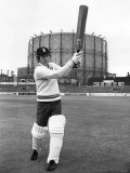 Andy Williams  Swinging His Bat in the Shadow of the Oval's Famous Gasometer