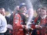 Carlos Reutemann of Ferrari Winner with Champagne After Motor Racing