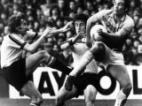 West Ham's Trevor Brooking Clashes with Watford's Booth and Gower During the West Ham vs Watford