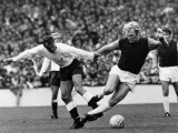 Bobby Moore of West Ham is Tripped by Tottenham Hotspur Forward Jimmy Greaves