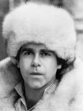 Elton John Pop Singer Wearing a White Fur Hat and Coat