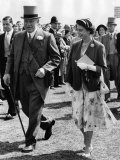 The Queen Wearing a Summer Dress  with Hat of Emerald Green and a Matching Short Coat