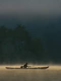 Kayaker Paddles Through Mist Rising From the Potomac River at Dawn