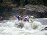 Rafters Riding the Rock Strewn Gauley River Through a Mountain Gorge