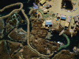 Manmade Reed Island Stitched Together in the Bay of Puno