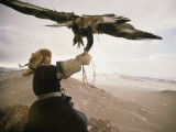 Kazakh Hunter Strains to Support a Golden Eagle