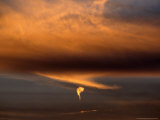 Strange Comma-Like Cloud Formation at Sunset