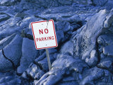 Road Sign Emerges Out of Hardened Lava
