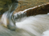 Water Cascades over a Rock in the Yosemite Valley