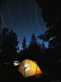 Time Exposure of a Camper's Tent and Star Trails