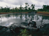 Pond of Waste Oil  and Drums