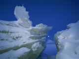 Moon is Framed by Wild Ice Formations