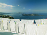Laundry Hanging Out To Dry with a Scenic Hilltop View of the Water