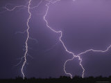 Dramatic Bolts of Lightning Crisscross a Night Sky