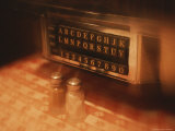 Tableside Jukebox and Salt and Pepper Shakers on a Table in a Diner