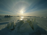 Sun Sets over a Field of Ice in Canada